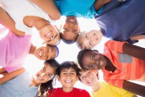 diverse circle of children's happy faces