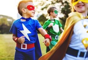 children dressed as superheros