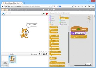 Screen shot of Scratch programming environment, including cartoon cat and colored coding blocks